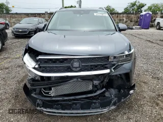 2024 Volkswagen Taos SE z VIN 3VVSX7B24RM131777, wystawiony jako Copart lot #59668105 z przebiegiem 11 100 mil mil oraz Nie do naprawy • Non repairable. Historia ofert i sprzedaży dostępna na DreamBid. Obrazek 5.