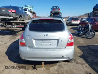 2007 Hyundai Accent GS with VIN KMHCM36C97U043769, listed as a IAAI auction lot 41526011 with 230,566 mi miles. Bid and sale history available at carsss.com. Image 16.