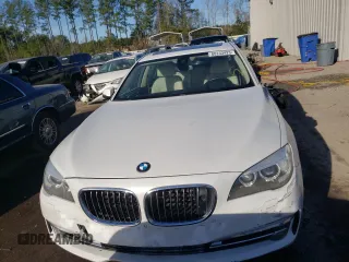 2013 BMW 7 Series 750i with VIN WBAYA8C55DC996693, listed as a Copart auction lot 80233423 with 140,925 mi miles and Salvage Title. Bid and sale history available at DreamBid. Image 5.