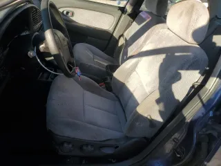 2004 Kia Spectra z VIN KNAFB121045315435, wystawiony jako Copart lot #83082084 z przebiegiem 94 974 mil mil oraz Czysty tytuł • Clean title. Historia ofert i sprzedaży dostępna na DreamBid. Obrazek 7.