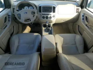 2007 Ford Escape Limited with VIN 1FMCU04177KA09776, listed as a Copart auction lot 60784535 with 175,679 mi miles and Salvage title. Bid and sale history available at DreamBid. Image 8.
