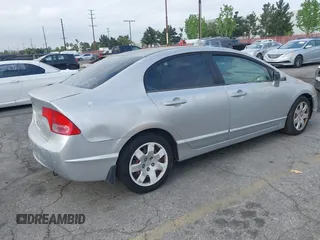 2006 Honda Civic LX with VIN 1HGFA165X6L144003, listed as a IAAI auction lot 42115624 with 310,261 mi miles and . Bid and sale history available at DreamBid. Image 4.
