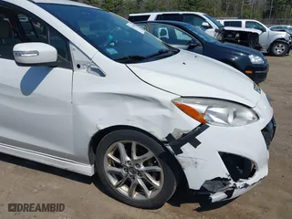 2013 Mazda Mazda5 Grand Touring with VIN JM1CW2DL7D0157980, listed as a IAAI auction lot 42114014 with 201,562 mi miles. Bid and sale history available at carsss.com. Image 6.