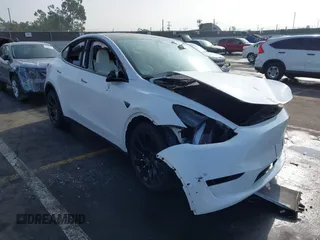 2023 Tesla Model Y Long Range with VIN 7SAYGDEE3PF900030, listed as a IAAI auction lot 41147192 with 13,903 mi miles and . Bid and sale history available at DreamBid. Image 1.
