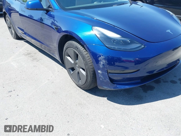 2023 Tesla Model 3 with VIN 5YJ3E1EA1PF431190, listed as a IAAI auction lot 41980007 with 26,164 mi miles and . Bid and sale history available at DreamBid. Image 19.