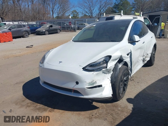 2021 Tesla Model Y Long Range with VIN 5YJYGDEE8MF125104, listed as a IAAI auction lot 41698065 with 25,177 mi miles and . Bid and sale history available at DreamBid. Image 16.