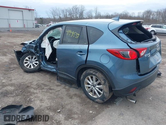 2016 Mazda CX-5 Touring with VIN JM3KE4CY8G0858045, listed as a IAAI auction lot 41941537 with 103,532 mi miles. Bid and sale history available at carsss.com. Image 3.