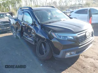 2018 Honda Ridgeline RTL-E with VIN 5FPYK3F78JB013981, listed as a IAAI auction lot 41844954 with 101,794 mi miles and . Bid and sale history available at DreamBid. Image 1.