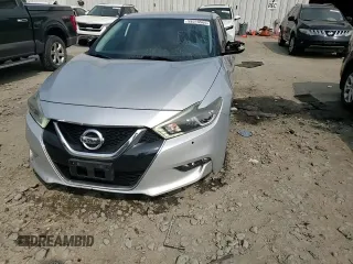 2018 Nissan Maxima SL with VIN 1N4AA6AP4JC363584, listed as a Copart auction lot 59315565 with 126,627 mi miles and Salvage title. Bid and sale history available at DreamBid. Image 13.