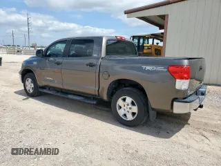 2010 Toyota Tundra with VIN 5TFDW5F12AX123529, listed as a Copart auction lot 60132615 with 264,205 mi miles and Clean title. Bid and sale history available at DreamBid. Image 2.