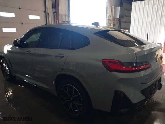 2023 BMW X4 M40i with VIN 5UX43DT03P9R26280, listed as a IAAI auction lot 41318355 with 21,587 mi miles. Bid and sale history available at carsss.com. Image 14.