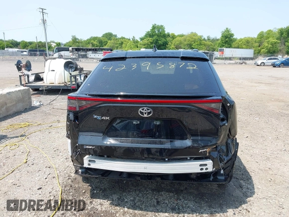 2024 Toyota bZ4X XLE with VIN JTMABACA7RA061457, listed as a IAAI auction lot 42395872 with 16,558 mi miles and . Bid and sale history available at DreamBid. Image 17.