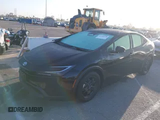 2024 Toyota Prius LE z VIN JTDACAAU8R3046786, wystawiony jako IAAI lot #42249270 z przebiegiem 7862 mil mil oraz . Historia ofert i sprzedaży dostępna na DreamBid. Obrazek 2.