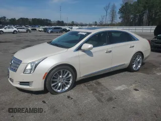 2013 Cadillac XTS Platinum z VIN 2G61U5S32D9230179, wystawiony jako Copart lot #49861875 z przebiegiem 101 284 mil mil oraz Szkoda całkowita • Salvage title. Historia ofert i sprzedaży dostępna na DreamBid. Obrazek 1.