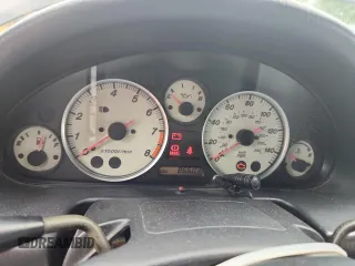 2004 Mazda MX-5 Miata LS with VIN JM1NB353140408906, listed as a Copart auction lot 56664715 with 86,603 mi miles and Salvage title. Bid and sale history available at DreamBid. Image 9.