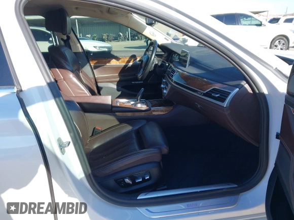 2018 BMW 7 Series 750i with VIN WBA7F0C57JGM23667, listed as a IAAI auction lot 41581035 with 113,140 mi miles and . Bid and sale history available at DreamBid. Image 5.