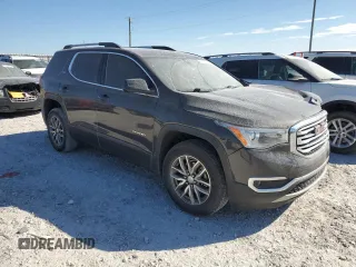 2018 GMC Acadia SLE with VIN 1GKKNLLS4JZ237696, listed as a Copart auction lot 77157914 with 95,695 mi miles and Salvage Title. Bid and sale history available at DreamBid. Image 4.
