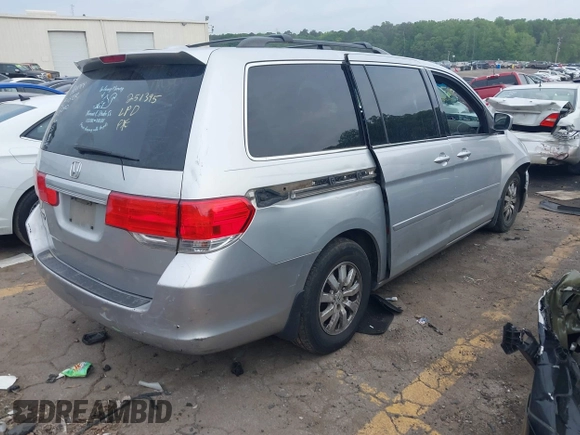 2010 Honda Odyssey EX-L z VIN 5FNRL3H78AB036216, wystawiony jako IAAI lot #42115792 z przebiegiem 234 057 mil mil oraz . Historia ofert i sprzedaży dostępna na DreamBid. Obrazek 4.