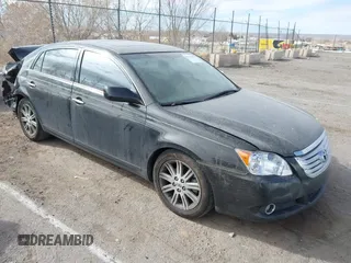 2009 Toyota Avalon XL with VIN 4T1BK36B59U325810, listed as a IAAI auction lot 41337809 with 184,476 mi miles. Bid and sale history available at carsss.com. Image 1.