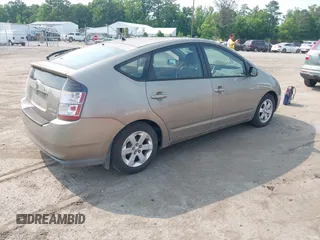 2005 Toyota Prius z VIN JTDKB20U653102295, wystawiony jako IAAI lot #42441198 z przebiegiem 279 623 mil mil oraz . Historia ofert i sprzedaży dostępna na DreamBid. Obrazek 4.