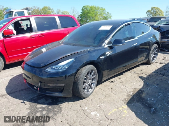 2020 Tesla Model 3 Long Range z VIN 5YJ3E1EB3LF622290, wystawiony jako IAAI lot #41978398 z przebiegiem 59 127 mil mil oraz . Historia ofert i sprzedaży dostępna na DreamBid. Obrazek 2.