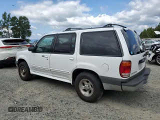 2001 Ford Explorer XLT with VIN 1FMZU73E31UB04094, listed as a Copart auction lot 62517655 with 85,961 mi miles and Salvage title. Bid and sale history available at DreamBid. Image 2.