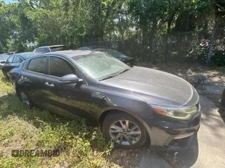 2019 Kia Optima LX z VIN 5XXGT4L34KG293731, wystawiony jako Copart lot #62179155 z przebiegiem 94 681 mil mil oraz Szkoda całkowita • Salvage title. Historia ofert i sprzedaży dostępna na DreamBid. Obrazek 1.