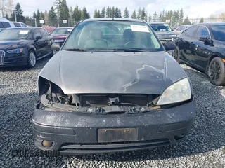 2006 Ford Focus S z VIN 1FAFP34NX6W179320, wystawiony jako IAAI lot #41937794 z przebiegiem 211 961 mil mil oraz . Historia ofert i sprzedaży dostępna na DreamBid. Obrazek 11.