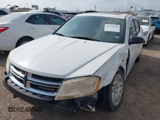 2013 Dodge Avenger SE with VIN 1C3CDZAB6DN548104, listed as a IAAI auction lot 41918928 with 189,315 mi miles and . Bid and sale history available at carsss.com. Image 2.