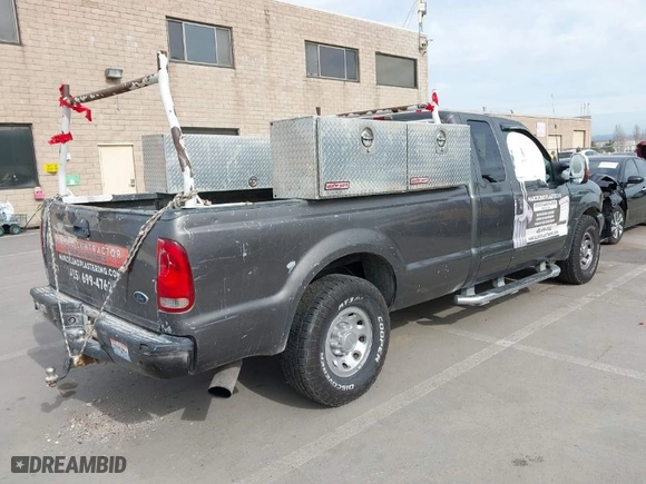 2003 Ford Super Duty F-250 XL with VIN 1FTNX20P43ED75097, listed as a IAAI auction lot 41841802 with 218,308 mi miles. Bid and sale history available at carsss.com. Image 4.