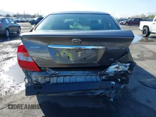 2004 Toyota Camry LE with VIN 4T1BF30K94U577260, listed as a IAAI auction lot 41906287 with 68,499 mi miles. Bid and sale history available at carsss.com. Image 17.