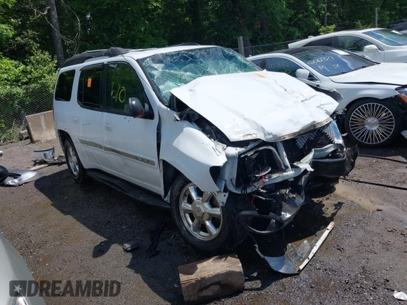 2003 GMC Envoy SLT z VIN 1GKES16S136235222, wystawiony jako IAAI lot #42245115 z przebiegiem Nie podano mil oraz . Historia ofert i sprzedaży dostępna na DreamBid. Obrazek 1.