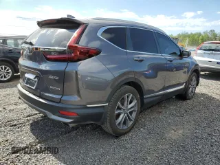 2021 Honda CR-V Touring z VIN 2HKRW2H95MH675002, wystawiony jako Copart lot #57340315 z przebiegiem 41 159 mil mil oraz Szkoda całkowita • Salvage title. Historia ofert i sprzedaży dostępna na DreamBid. Obrazek 3.