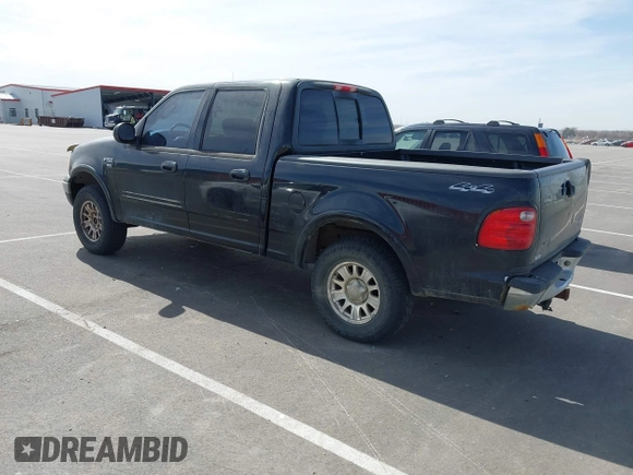 2003 Ford F-150 XLT with VIN 1FTRW08L83KA14760, listed as a IAAI auction lot 41820943 with 215,130 mi miles. Bid and sale history available at carsss.com. Image 3.
