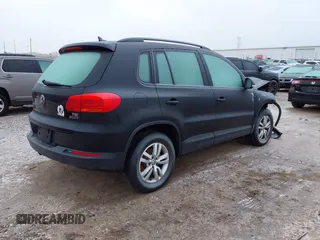 2017 Volkswagen Tiguan S with VIN WVGBV7AX8HK027148, listed as a IAAI auction lot 41215649 with 132,690 mi miles and . Bid and sale history available at DreamBid. Image 4.