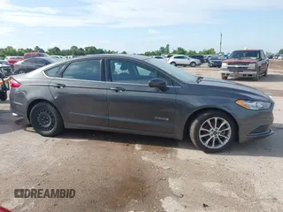 2017 Ford Fusion Hybrid SE with VIN 3FA6P0LU5HR336779, listed as a IAAI auction lot 42691789 with 140,720 mi miles and . Bid and sale history available at DreamBid. Image 13.