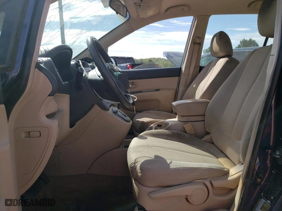 2007 Kia Rondo EX with VIN KNAFG526177051557, listed as a Copart auction lot 69931764 with 0 mi miles and Salvage Title. Bid and sale history available at carsss.com. Image 7.