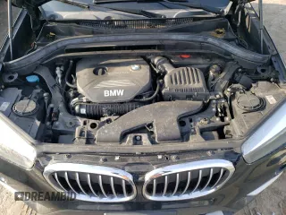 2017 BMW X1 sDrive28i with VIN WBXHU7C30H5H33353, listed as a Copart auction lot 47473445 with 97,579 mi miles and Salvage Title. Bid and sale history available at carsss.com. Image 12.