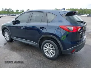 2016 Mazda CX-5 Sport with VIN JM3KE2BY0G0850298, listed as a IAAI auction lot 42107007 with 97,478 mi miles. Bid and sale history available at carsss.com. Image 3.