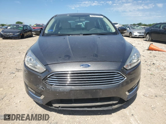 2017 Ford Focus Titanium с VIN 1FADP3N2XHL287713, выставлен на аукционе Copart как лот 57823155 с пробегом 51 828 миль миль и Списание • Salvage title. История ставок и продаж доступна на DreamBid. Изображение 5.