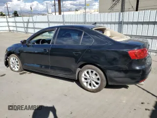 2011 Volkswagen Jetta SE with VIN 3VWDZ7AJ8BM383450, listed as a Copart auction lot 80899484 with 191,498 mi miles and Salvage title. Bid and sale history available at DreamBid. Image 2.