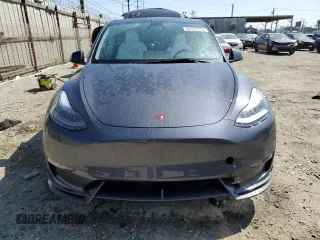 2023 Tesla Model Y Performance with VIN 7SAYGDEF0PF915030, listed as a Copart auction lot 50159375 with 19,772 mi miles and Salvage Title. Bid and sale history available at DreamBid. Image 5.