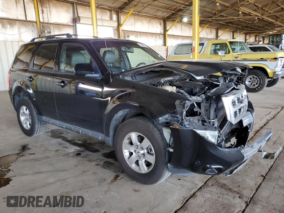 2010 Ford Escape Limited with VIN 1FMCU9EG2AKA78650, listed as a Copart auction lot 54402195 with 103,547 mi miles and Salvage title. Bid and sale history available at DreamBid. Image 4.