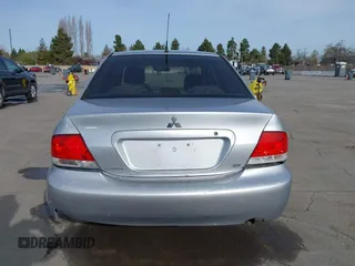 2004 Mitsubishi Lancer ES with VIN JA3AJ26E54U052124, listed as a IAAI auction lot 41804473 with 165,786 mi miles. Bid and sale history available at carsss.com. Image 17.