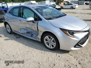 2019 Toyota Corolla Hatchback SE with VIN JTNK4RBE4K3055431, listed as a Copart auction lot 66910604 with 96,443 mi miles and Salvage Title. Bid and sale history available at carsss.com. Image 4.