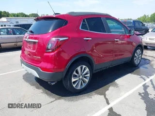 2020 Buick Encore Preferred with VIN KL4CJASB2LB063490, listed as a IAAI auction lot 42037574 with 57,350 mi miles. Bid and sale history available at carsss.com. Image 4.