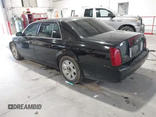 2002 Cadillac DeVille DTS with VIN 1G6KF579X2U141648, listed as a IAAI auction lot 42059624 with 179,338 mi miles. Bid and sale history available at carsss.com. Image 3.