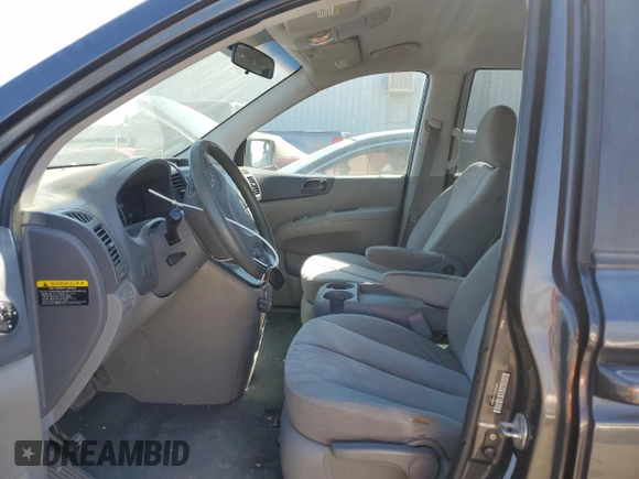 2012 Kia Sedona LX with VIN KNDMG4C71C6461660, listed as a Copart auction lot 70904534 with 163,548 mi miles and Clean Title. Bid and sale history available at carsss.com. Image 7.