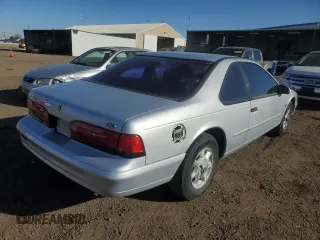 1995 Ford Thunderbird LX with VIN 1FALP62W4SH187234, listed as a Copart auction lot 86122364 with 57,256 mi miles and Clean Title. Bid and sale history available at DreamBid. Image 3.