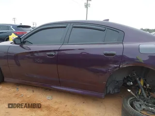 2021 Dodge Charger Scat Pack Widebody with VIN 2C3CDXGJ5MH579324, listed as a IAAI auction lot 41399676 with 77,156 mi miles and . Bid and sale history available at DreamBid. Image 14.